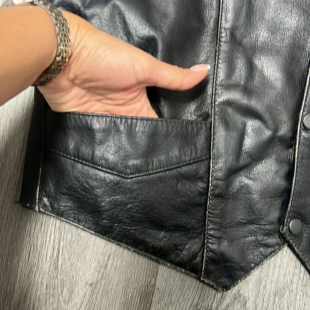 Frontier Leather Men’s Vest w/ the “Harley Davidson” patch on the back. Size 42